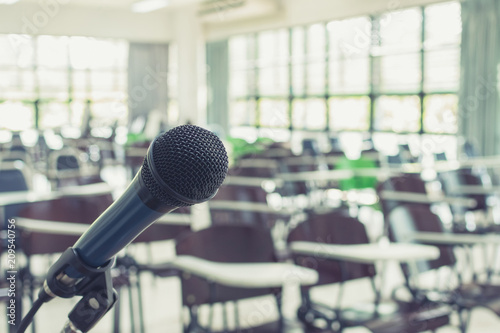 Microphone voice speaker in school lecture hall, seminar meeting room or educational business conference event for host, teacher or coaching mentor