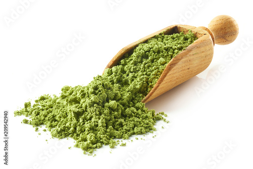 Scoop of green matcha tea powder