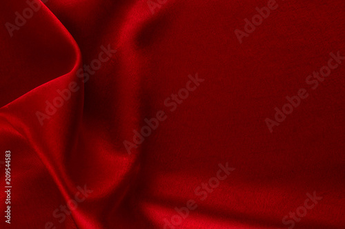 Abstract silk luxury background, piece of cloth, deep red cloth texture