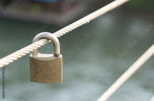 Closeup love padlock on the bridge, remember concept, selective focus