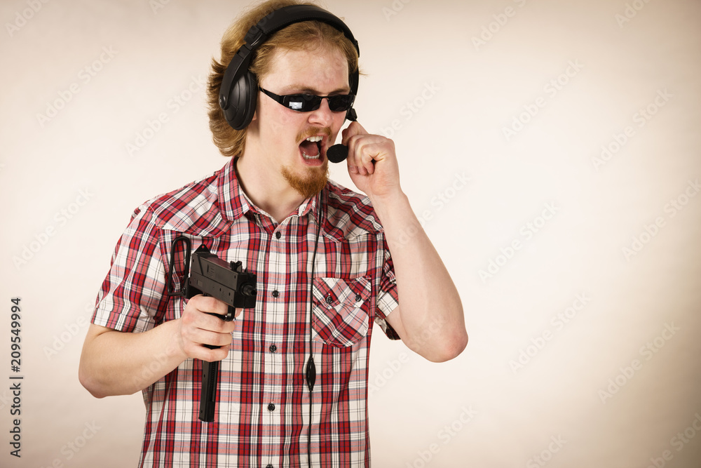 Gamer man shooting from gun Gamer man shooting from gun