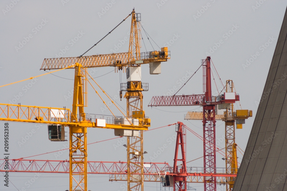 Lots Of Construction Cranes