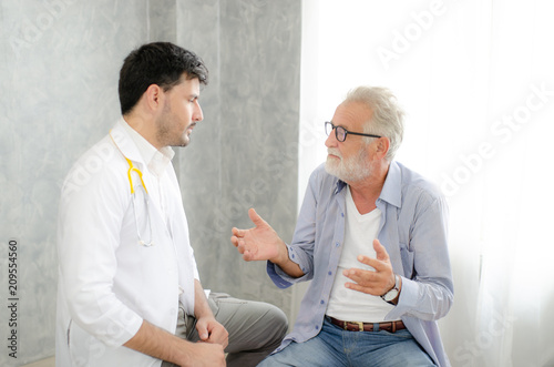 The patient tried to explain symptoms to the doctor.