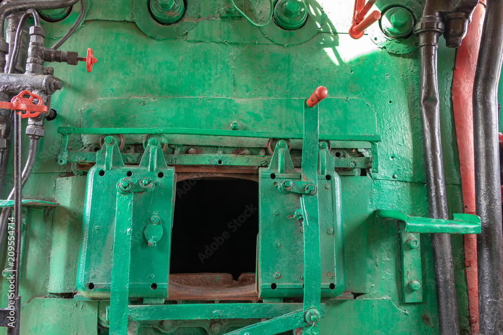 in the cabin of the locomotive, the furnace for coal