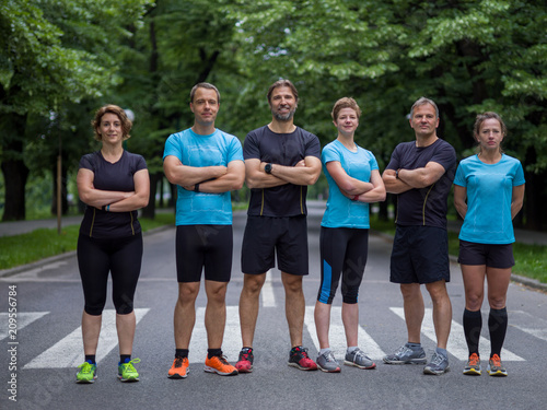 Fototapeta Naklejka Na Ścianę i Meble -  portrait of runners team on morning training