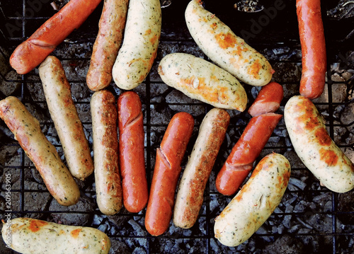 Variety Sausages and Wieners Grilled on Barbecue Grill 