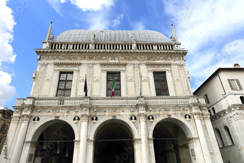 medieval architecture at Piazza della Loggia, market square of Brescia and UNESCO world heritage in Italy photo