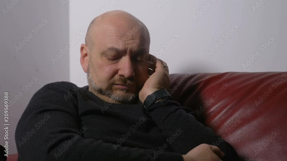 Depressed sad man alone crying. Portrait of upset man Depressed sad man alone crying. Portrait of upset man
