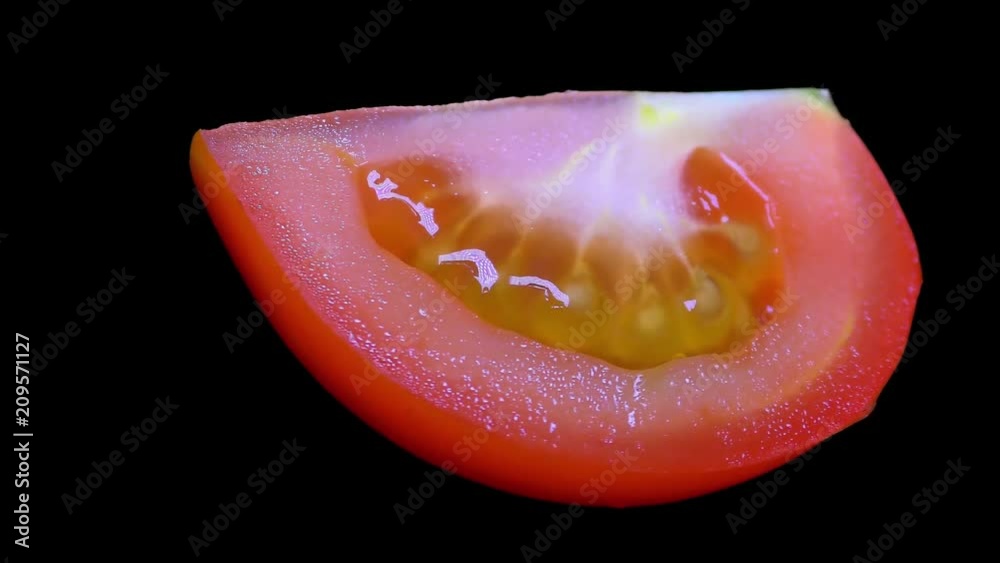 Cut Tomato Isolated on Black Background Cut Tomato Isolated on Black Background