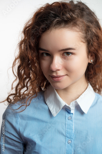 close up cropped portrait of pleasant female teen with stylish haircut. children's beauty. photo