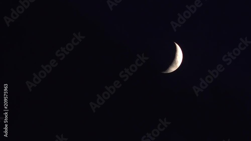 Time lapse of the moon as clouds pass over