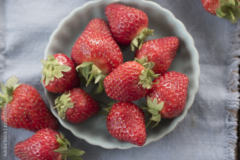 Strawberries in blue bowl 