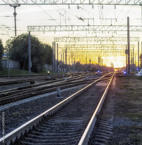Railway, several paths, sunset