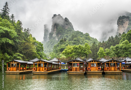 Baofeng Lake Boat Trip in a rainy day with clouds and mist at Wulingyuan, Zhangjiajie National Forest Park, Hunan Province, China, Asia