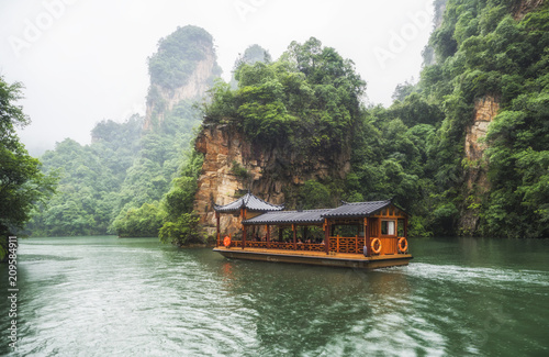 Baofeng Lake Boat Trip in a rainy day with clouds and mist at Wulingyuan  Zhangjiajie National Forest Park  Hunan Province  China  Asia
