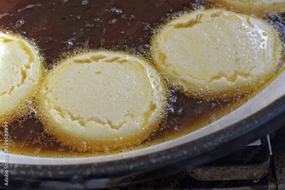 Brazilian street food: acaraje in the frying pan Brazilian street food: acaraje in the frying pan