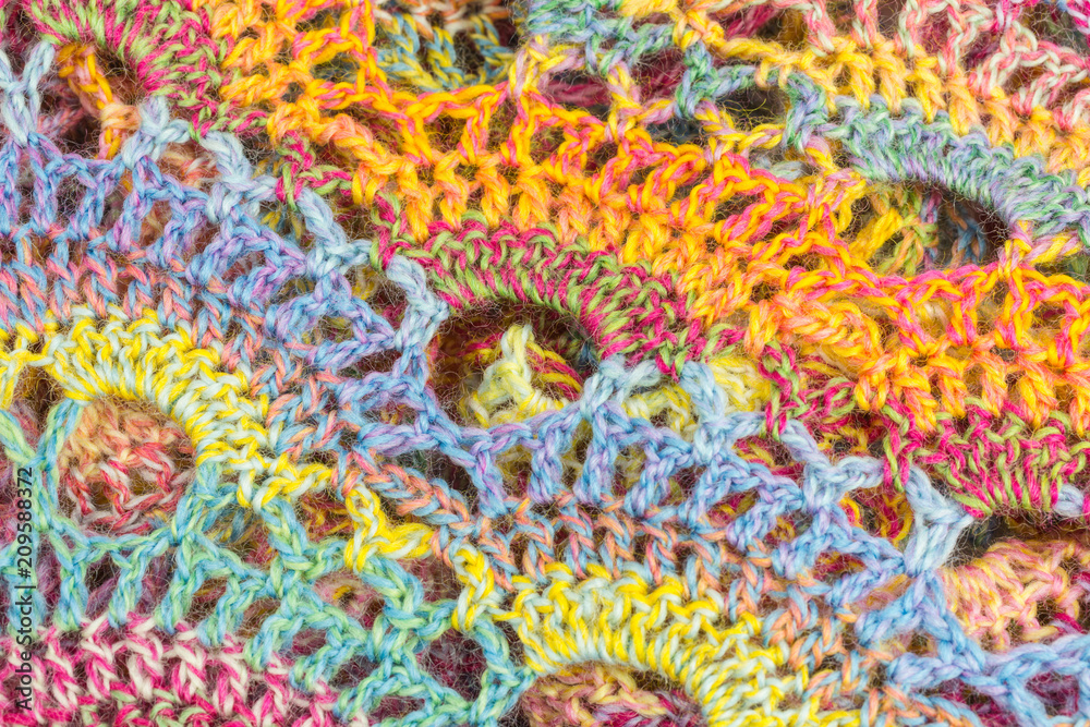 handmade multicolor crochet background with single crochet and double crochet stitches and chain stiches handmade multicolor crochet background with single crochet and double crochet stitches and chain stiches