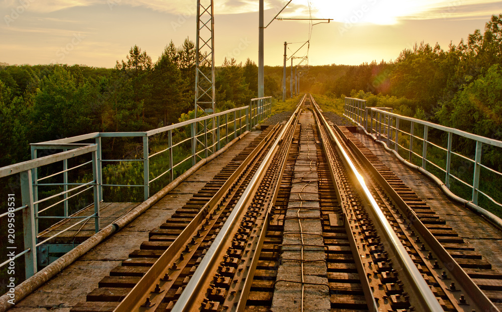 Obraz premium railway and sunset lights