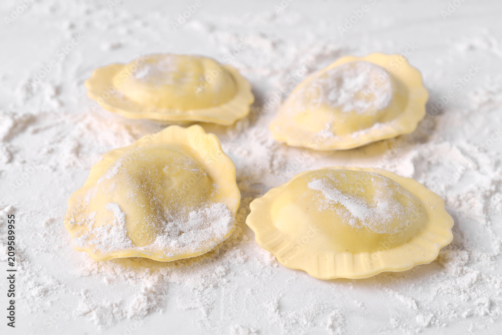 uncooked ravioli on marble uncooked ravioli on marble
