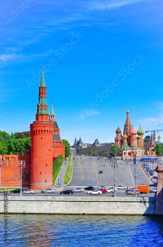 View of Kremlin and Red Square along the Moscow River in summer in Moscow, Russia.