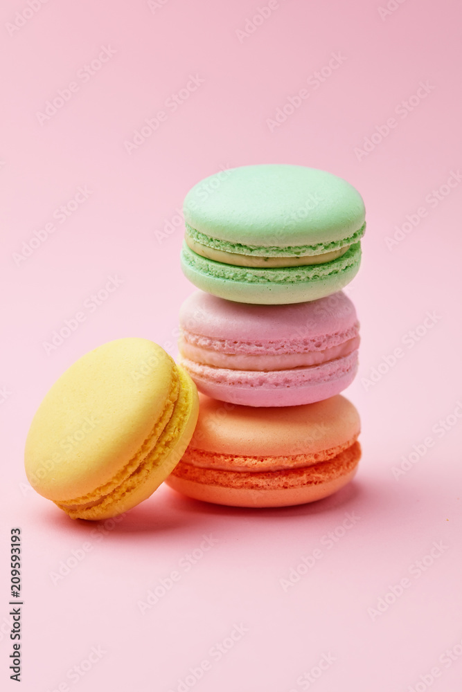 Macarons. Colorful Macaroons On Pink Background Macarons. Colorful Macaroons On Pink Background