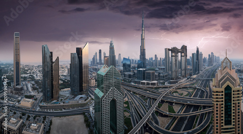 Photography Dubai skyline during sunset with amazing city center lights and road traffic UAE