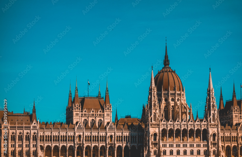 detailed view of parliament at budapest with darken sky as copy space
