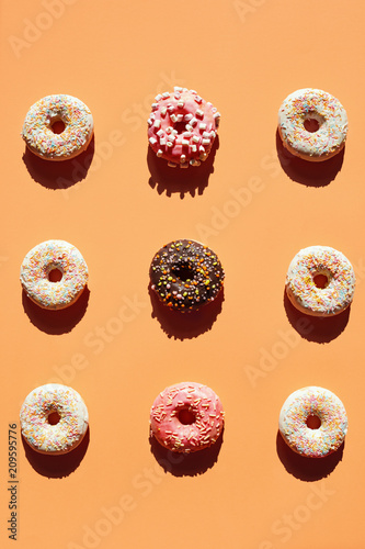 Sweet Donuts On Colorful Background