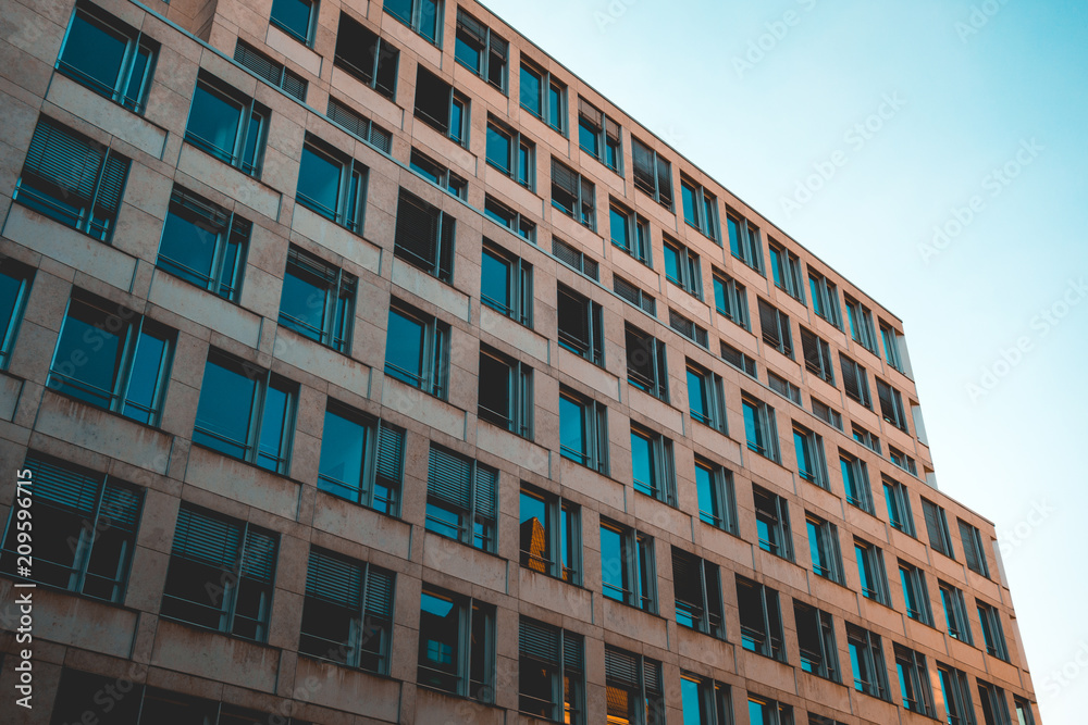 big orange finance building with square windows big orange finance building with square windows