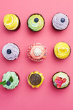 Colorful Cupcakes On Pink Background