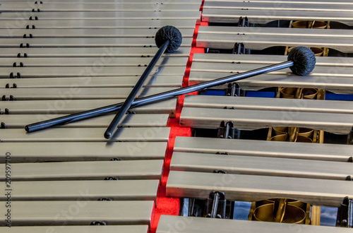 Fototapeta Sticks laying on top of a vibraphone musical instrument
