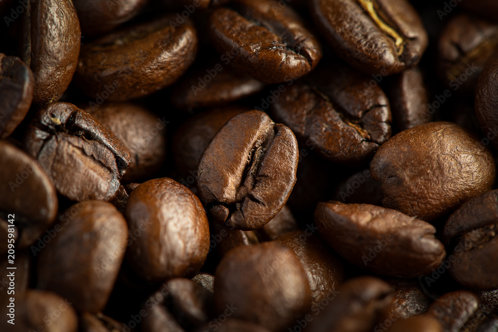 Roasted coffee beans. macro close-up view Roasted coffee beans. macro close-up view