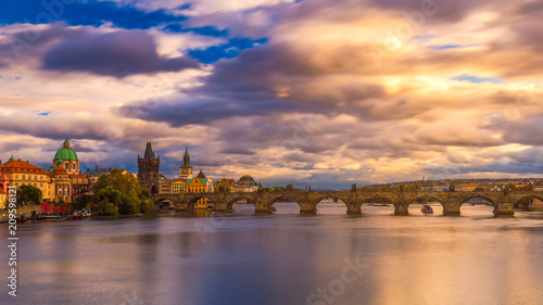 Famous iconic image of Charles bridge at sunset in spring  Prague  Czech Republic. Concept of world travel  sightseeing and tourism.