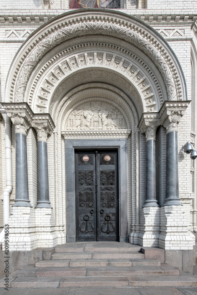 Kronstadt, Russia - June 10, 2018: Decorated door of Naval Cathedral Kronstadt, Russia - June 10, 2018: Decorated door of Naval Cathedral