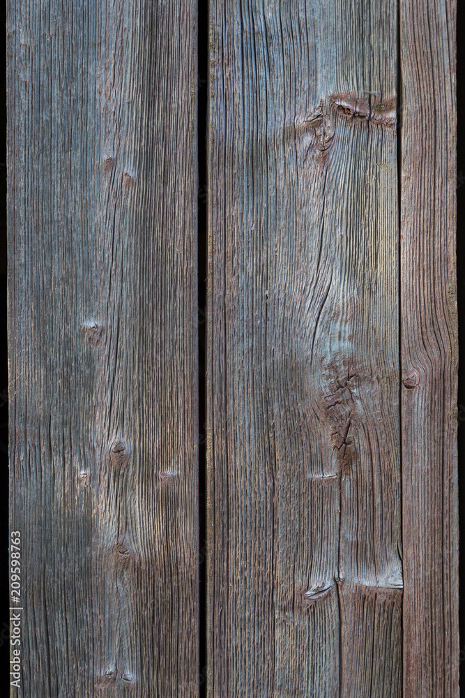 Close-up of an old and unpainted rustic wood board texture background Close-up of an old and unpainted rustic wood board texture background