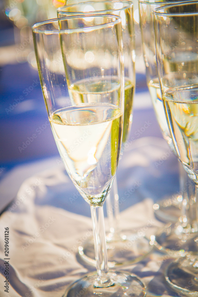 Champagne in flute glasses at a wedding Champagne in flute glasses at a wedding