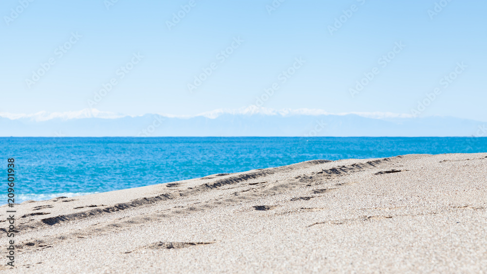 Kleopatra Beach. The view looking out to sea from Kleopatra Beach in southern Turkey. The beach is close to the point where Manavgat River enters the Mediterranean Sea. Kleopatra Beach. The view looking out to sea from Kleopatra Beach in southern Turkey. The beach is close to the point where Manavgat River enters the Mediterranean Sea.