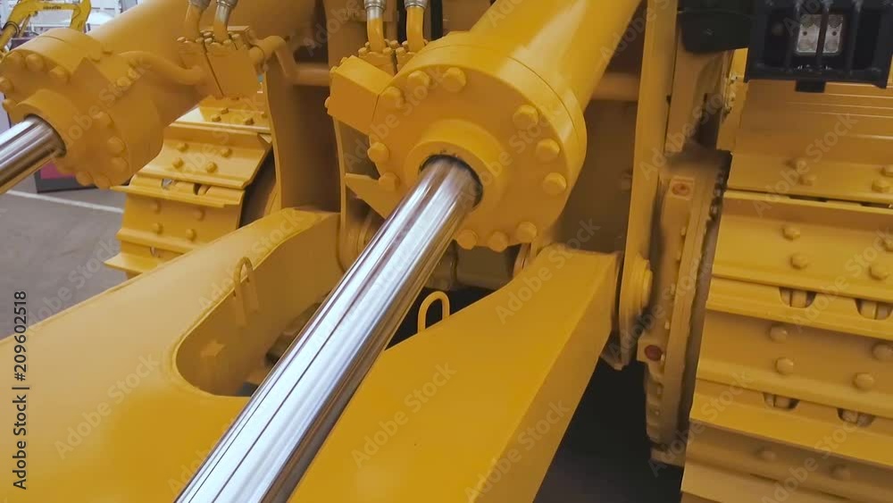Powerful hydraulic cylinders. The main power and driving element for construction equipment Powerful hydraulic cylinders. The main power and driving element for construction equipment
