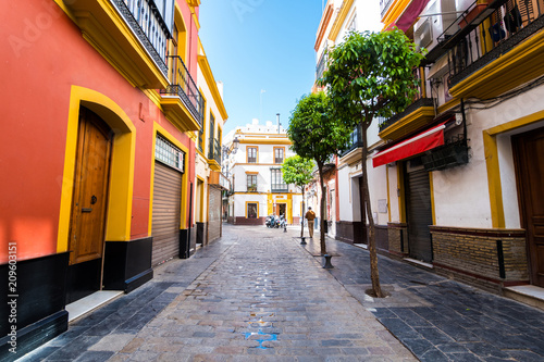 Fototapeta Naklejka Na Ścianę i Meble -  colorful streets of Seville old town, Spain