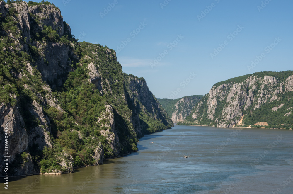 Danube border between Romania and Serbia. Landscape in the Danube Gorges.The narrowest part of the Gorge on the Danube between Serbia and Romania, also known as the Iron Gate.