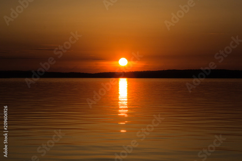 Colorful sunset or sunrise by the lake