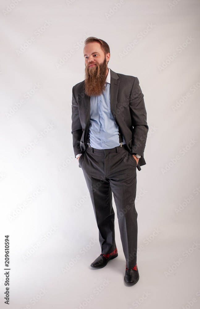 standing and looking cool hipster with beard standing and looking cool hipster with beard