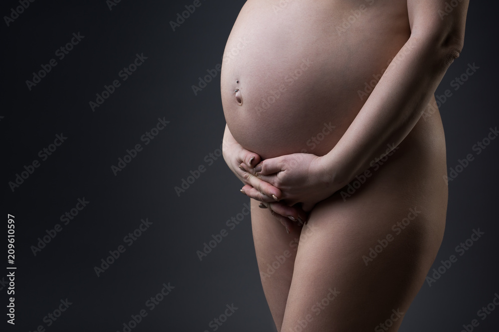 Art nude, sexy naked pregnant woman isolated on white background foto de  Stock | Adobe Stock
