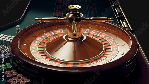 Loopable shot of roulette wheel with a spinning ball. Bets, Las Vegas, gambling. photo