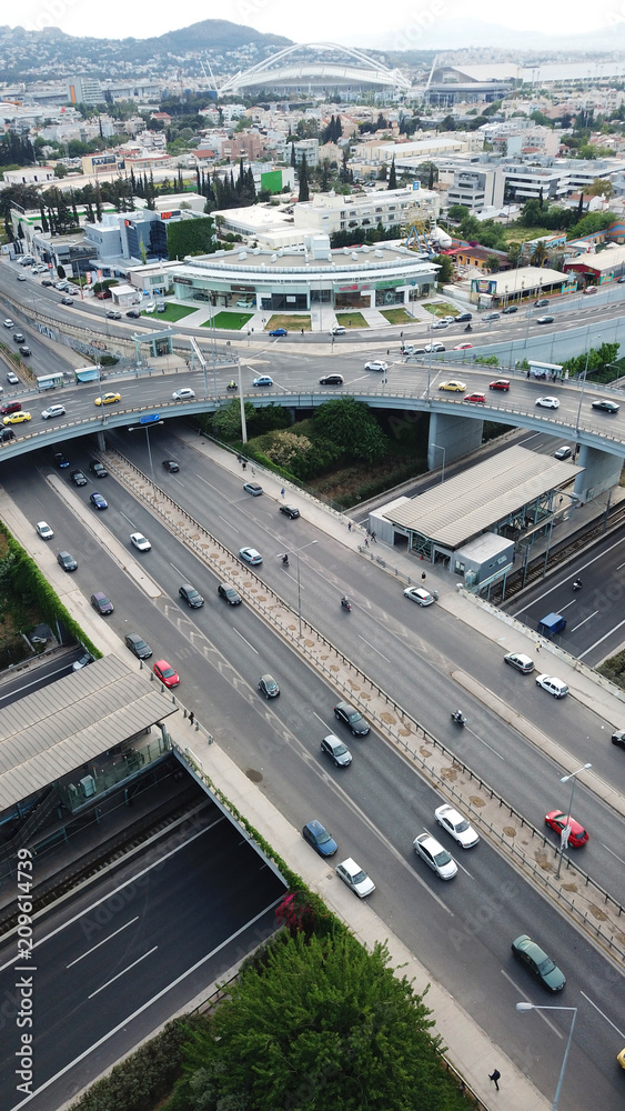 Aerial drone bird's eye view of popular highway of Attiki Odos multilevel junction ring road, passing through Kifisias Avenue in Marousi