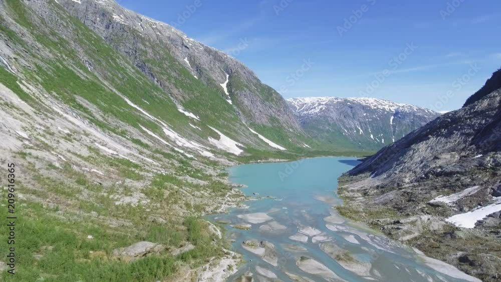 Aerial view near Nigardsbreen glacier in Nigardsvatnet Jostedalsbreen national park in Norway in a sunny day Aerial view near Nigardsbreen glacier in Nigardsvatnet Jostedalsbreen national park in Norway in a sunny day