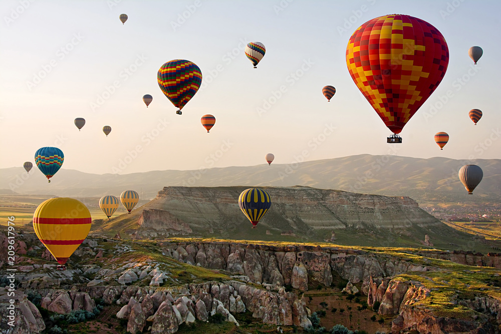 Obraz premium The great tourist attraction of Cappadocia - balloon flight. Cappadocia is known around the world as one of the best places to fly with hot air balloons. Goreme, Cappadocia, Turkey
