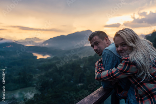 Couple hugging at sunset in   mountains close-up portrait © Аrtranq
