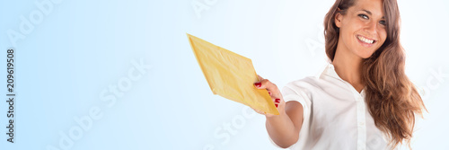 Young beautiful lady isolated on a colored background