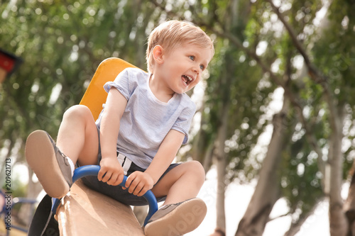 Cute little boy on children...